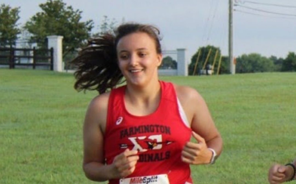 Close up of student’s face running in race