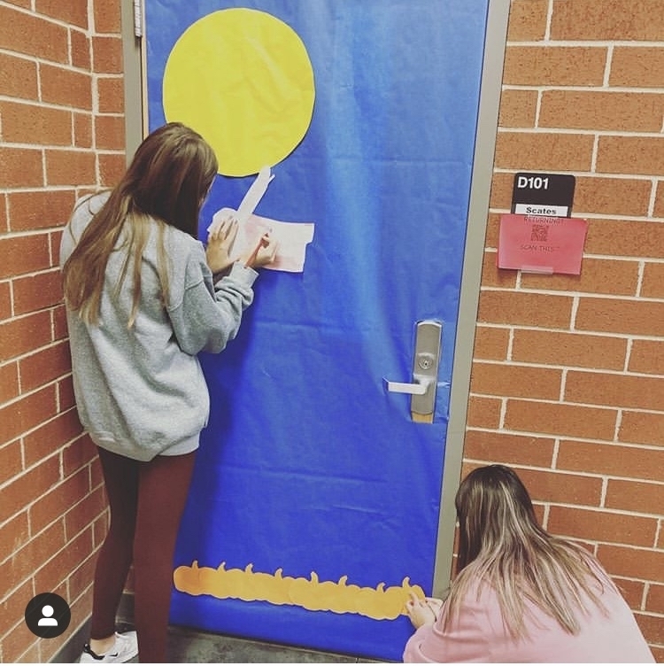 Students decorating door