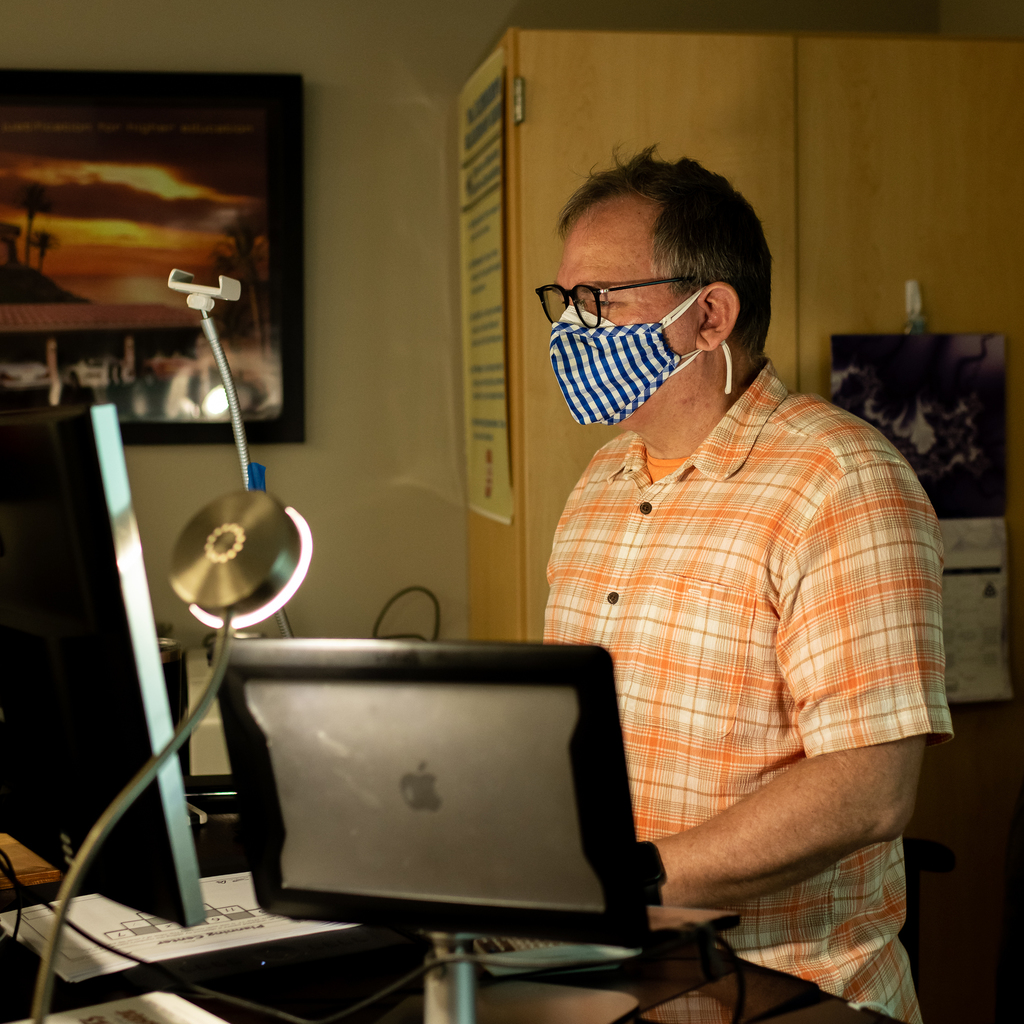 Slinkard at his computer
