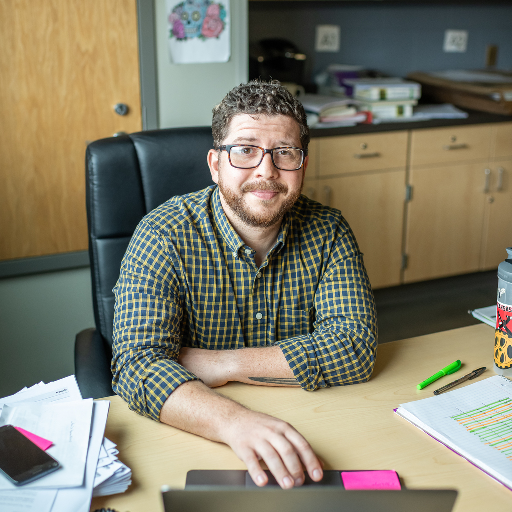 Smith at his desk