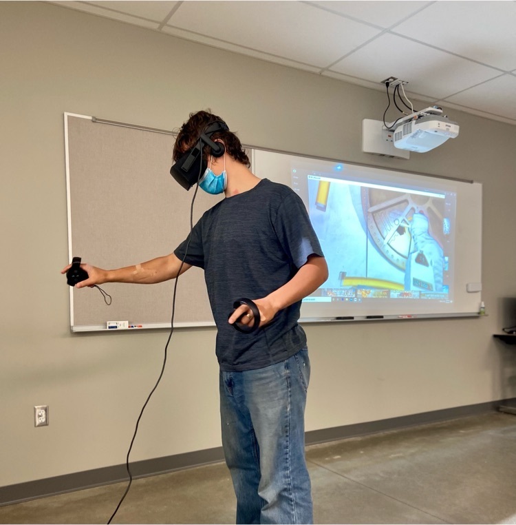 student playing VR