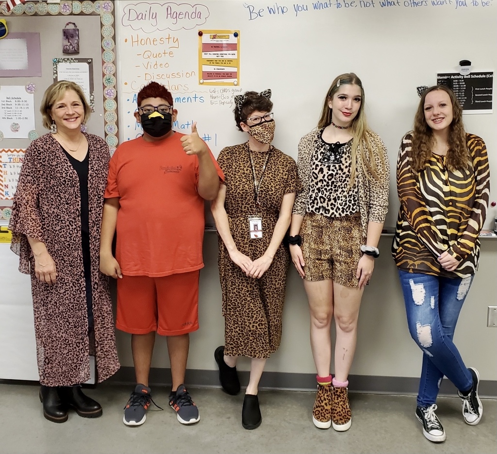 students & teachers showing off their animal clothes
