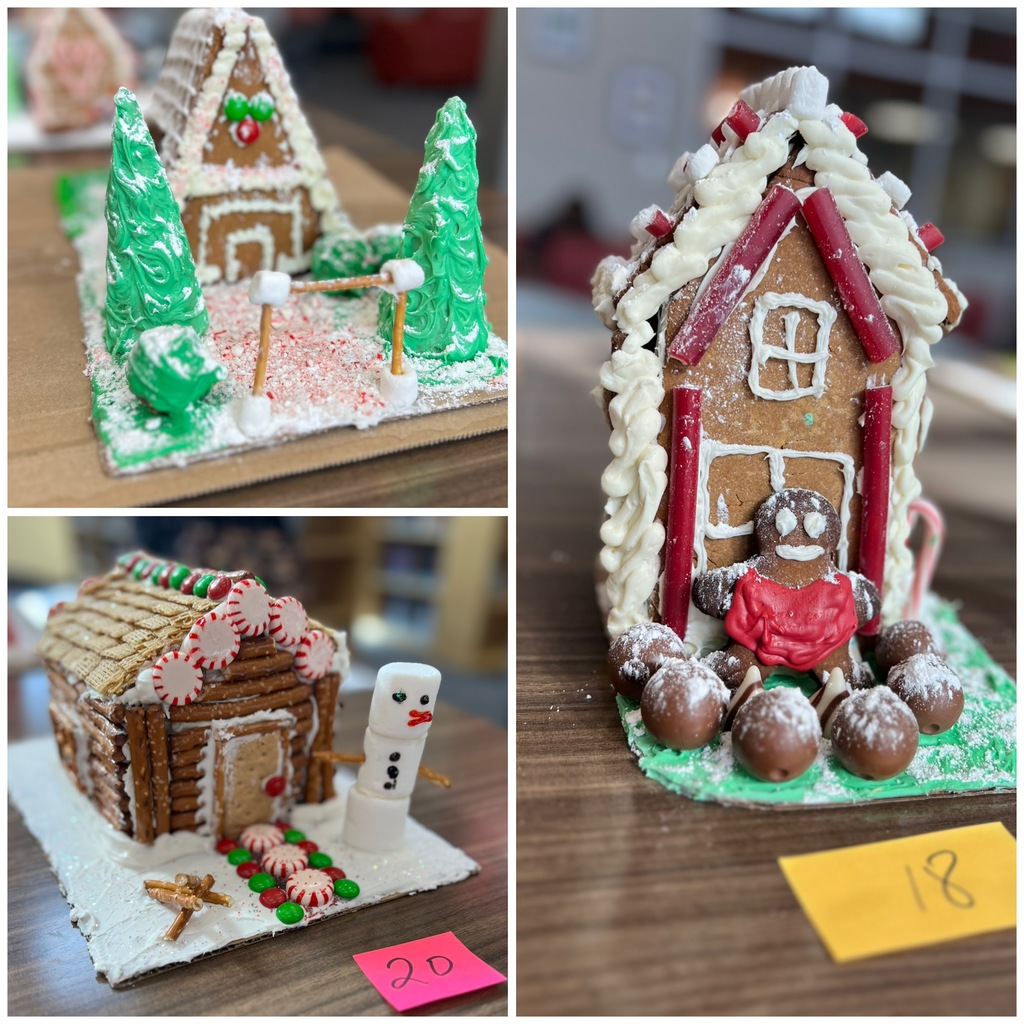 close up of three gingerbread houses