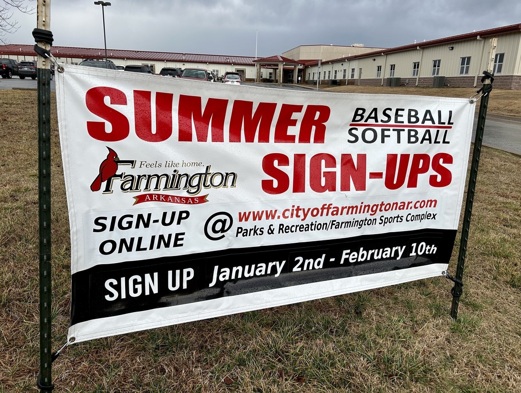 Summer Baseball/Softball sign up banner in front of the school.