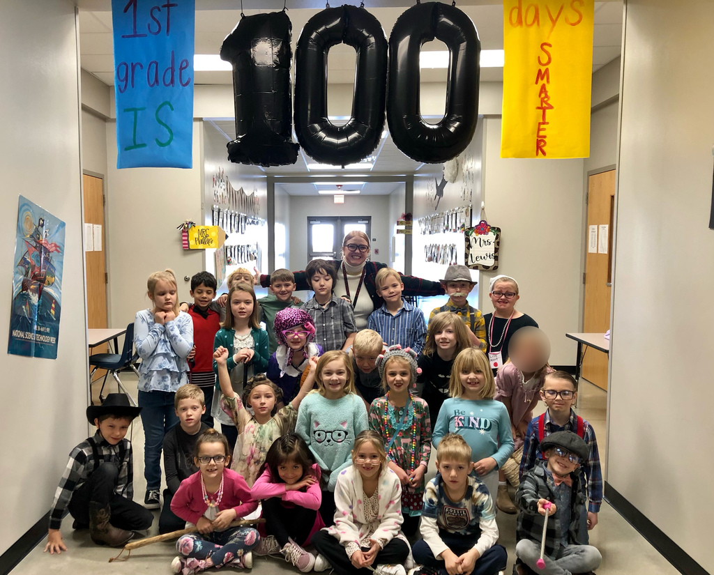 Ms. Tenison's class posed under 100th Day sign