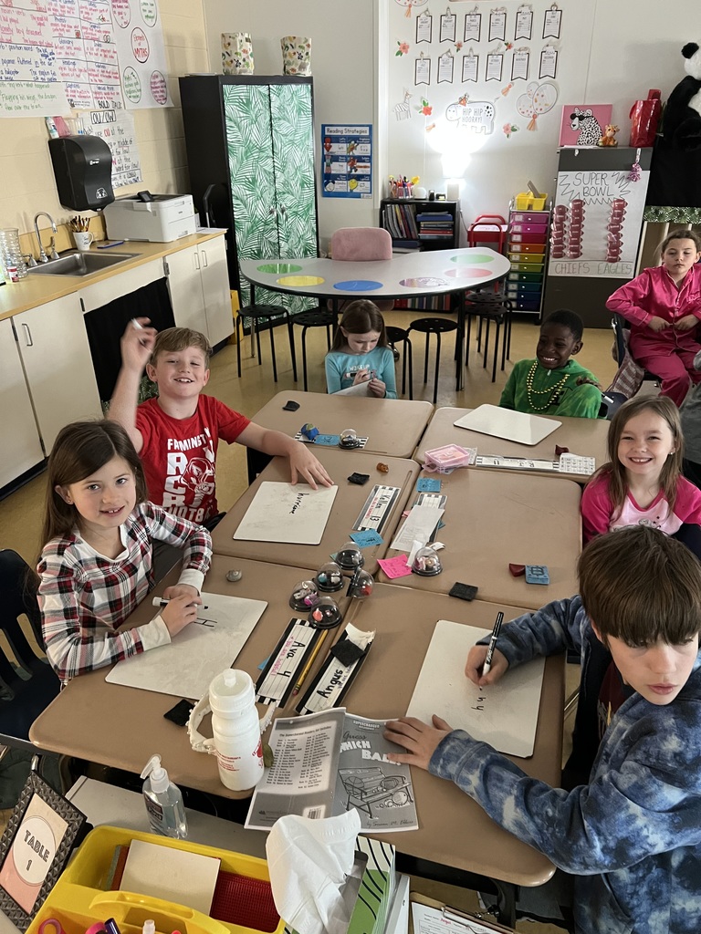 students showing off PJs