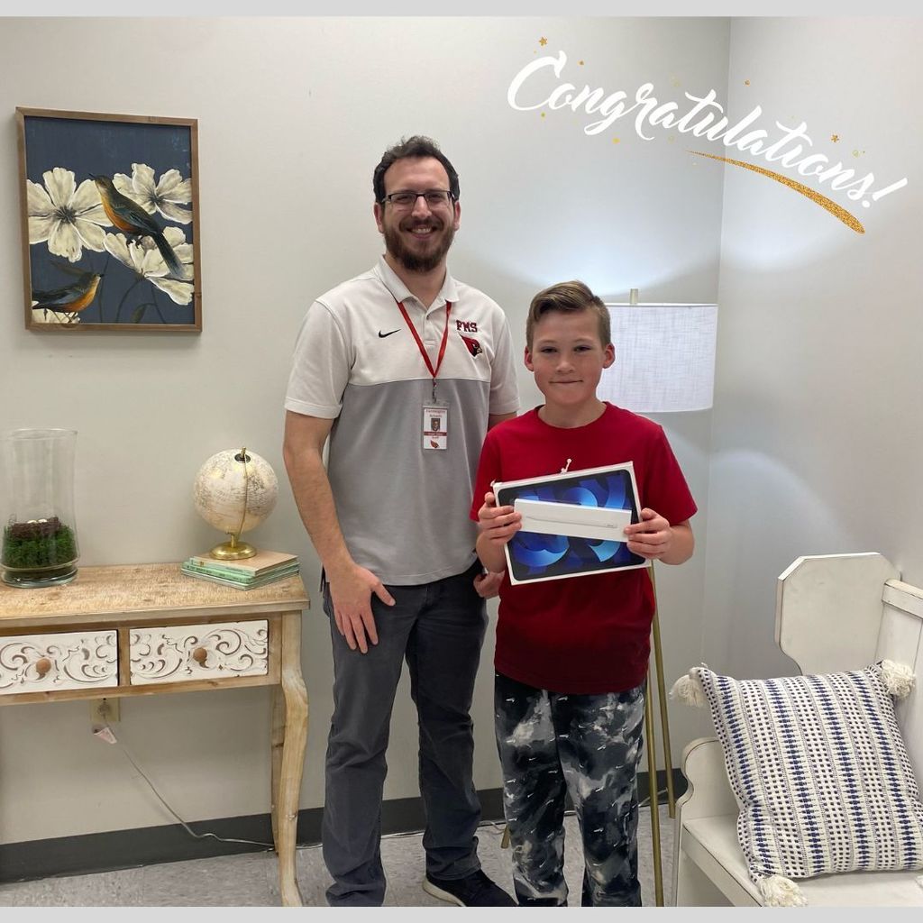William Schmidt in 5th grade, won our GT raffle! He won an iPad and an apple mouse. Congratulations!!