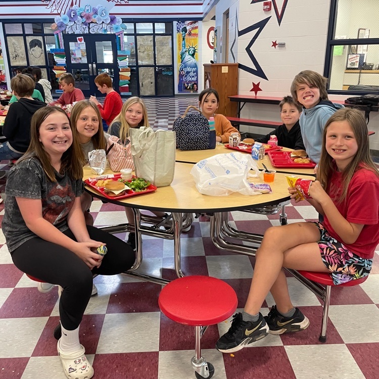 students having lunch at FMS in the lunch room  