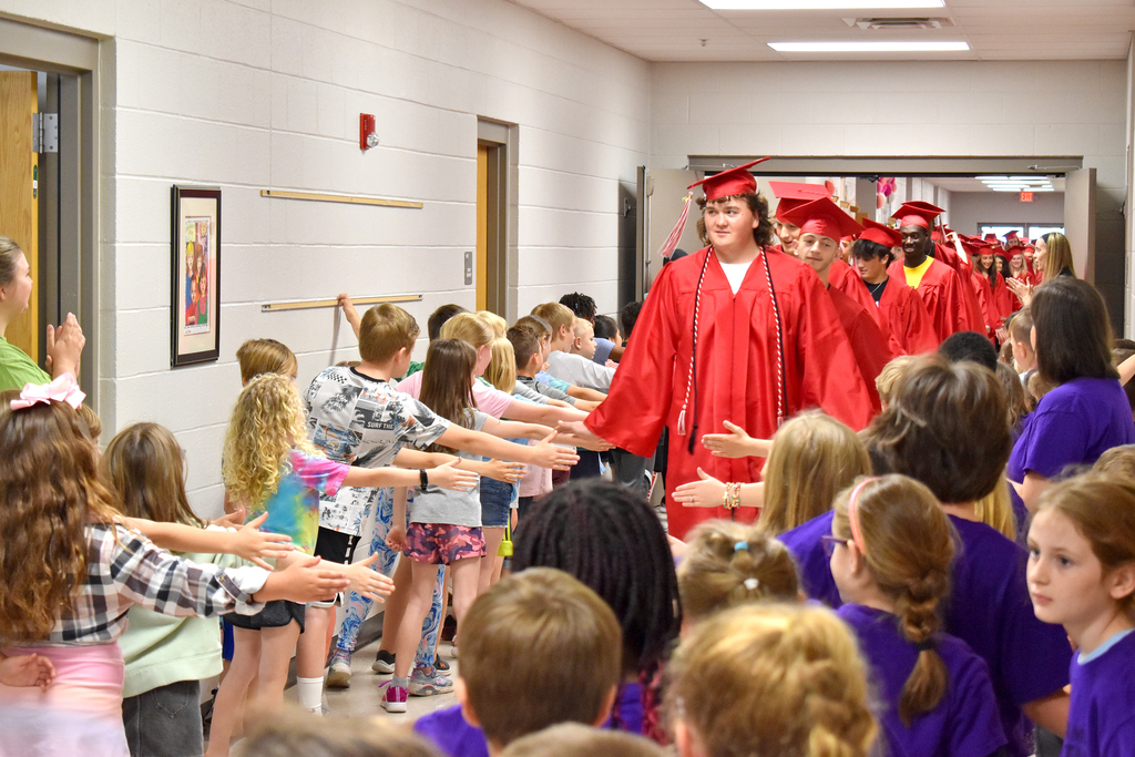 Graduating seniors start their walk-thru