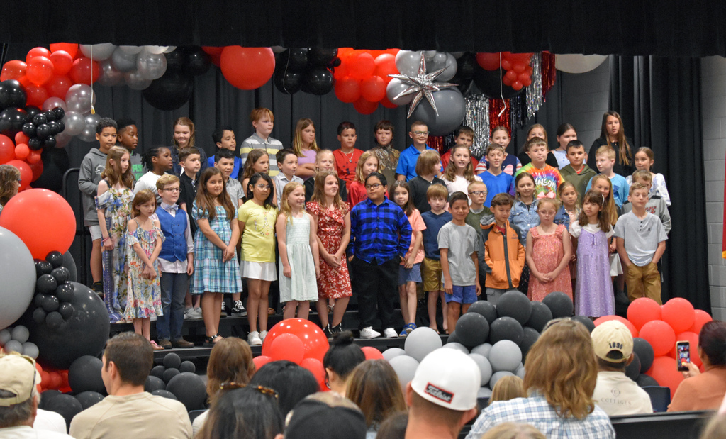 Mrs. Cumbie & Mr. K's classes on stage during Moving Up ceremony