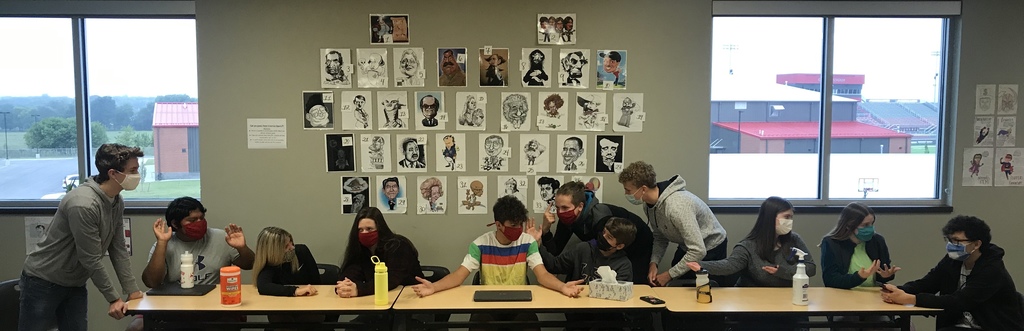 students posing in The Last Supper