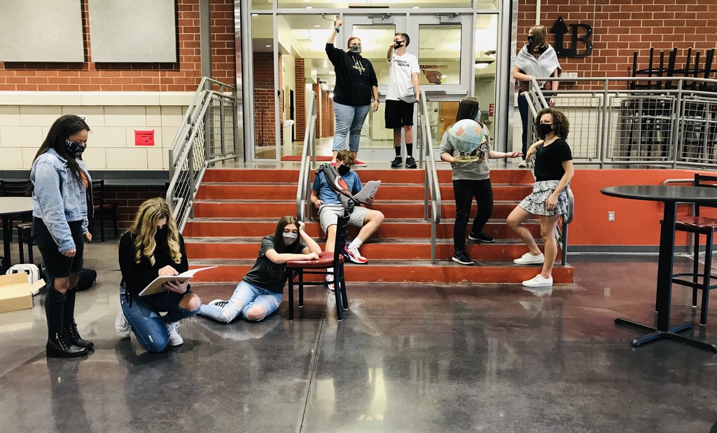 Students posing in the School of Athens